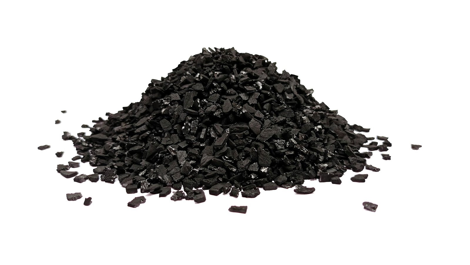 A cone-shaped pile of coarse black granular carbon